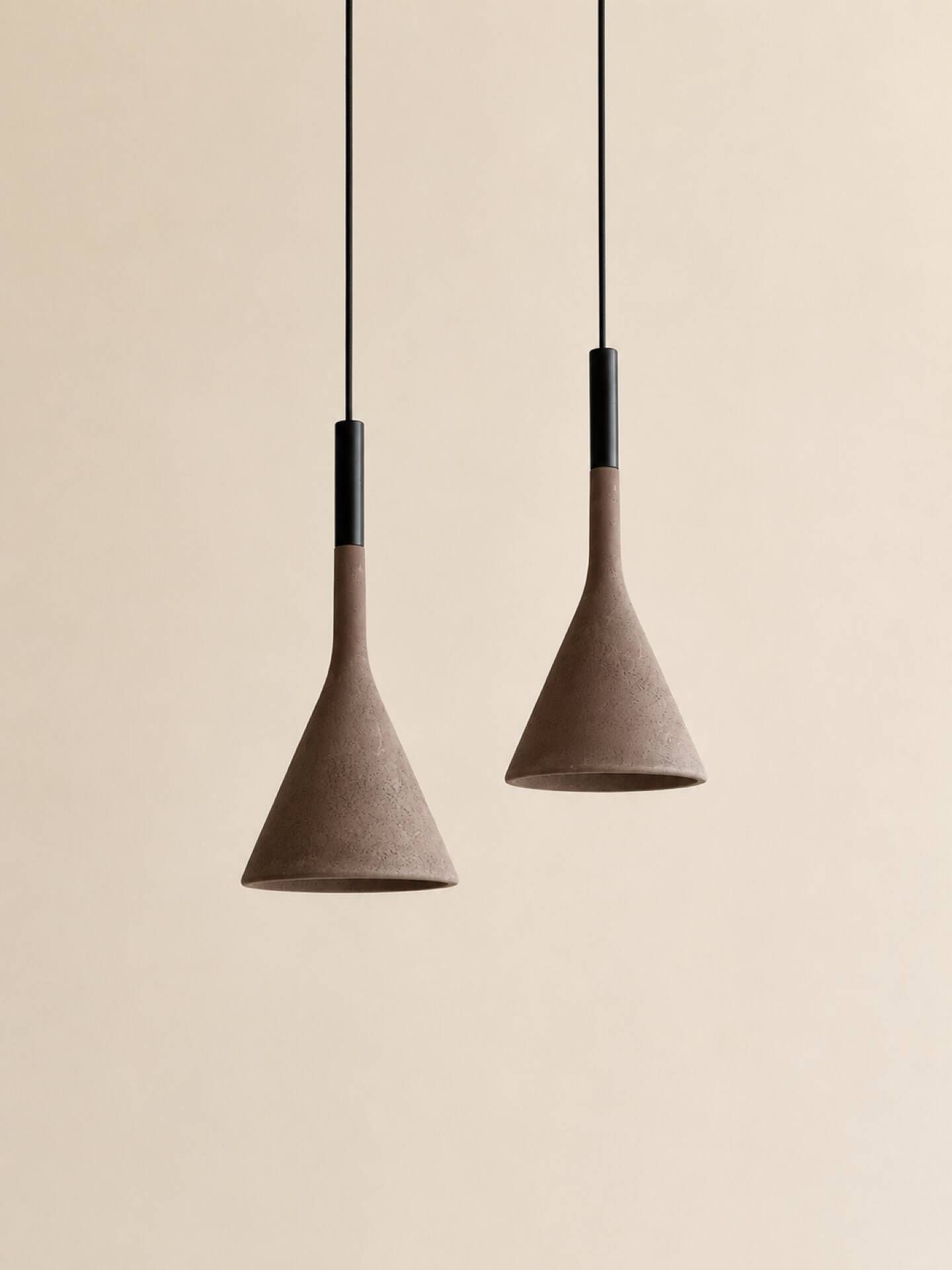 A pair of Aplomb concrete pendants by Lucidi & Pevere for Foscari.