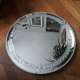 Large old round mirror finely decorated