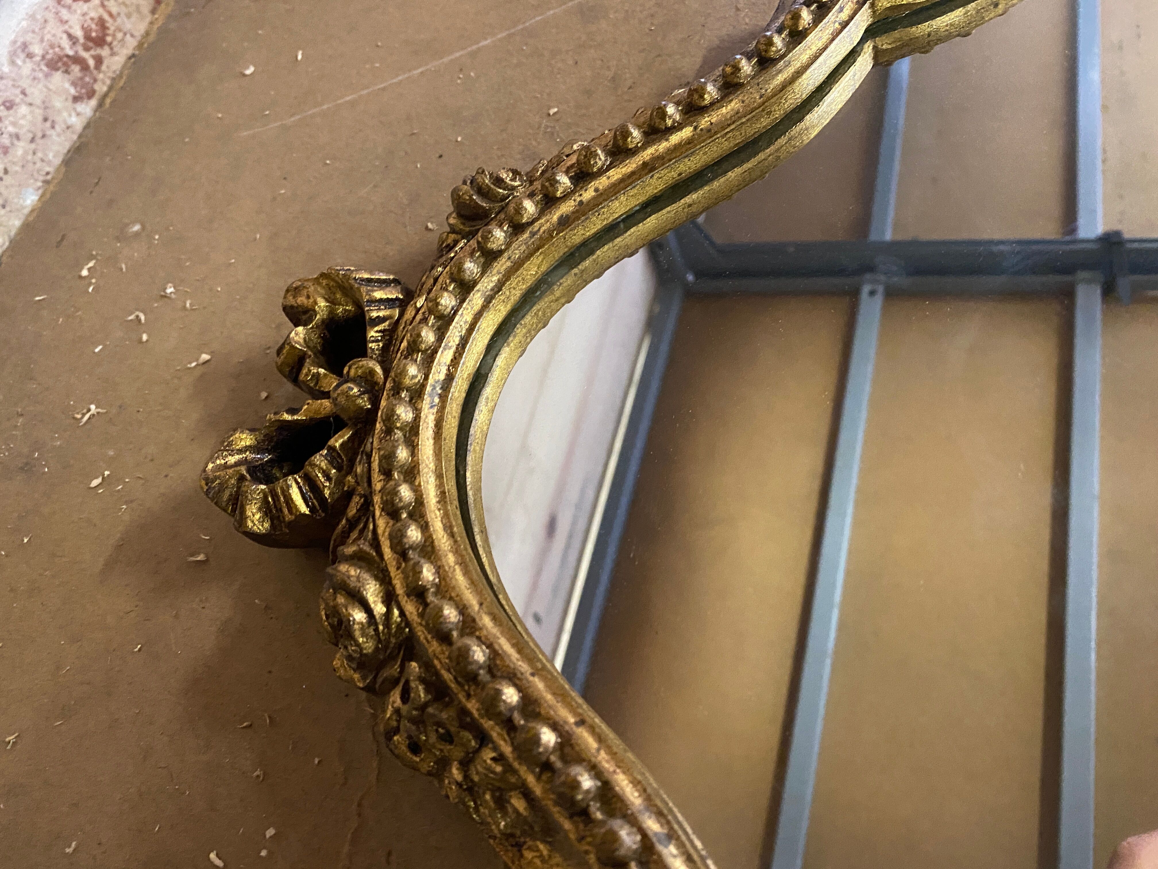 Miroir doré de style Louis XV 30x55cm