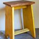 Art-populaire workshop stool in patinated painted wood
