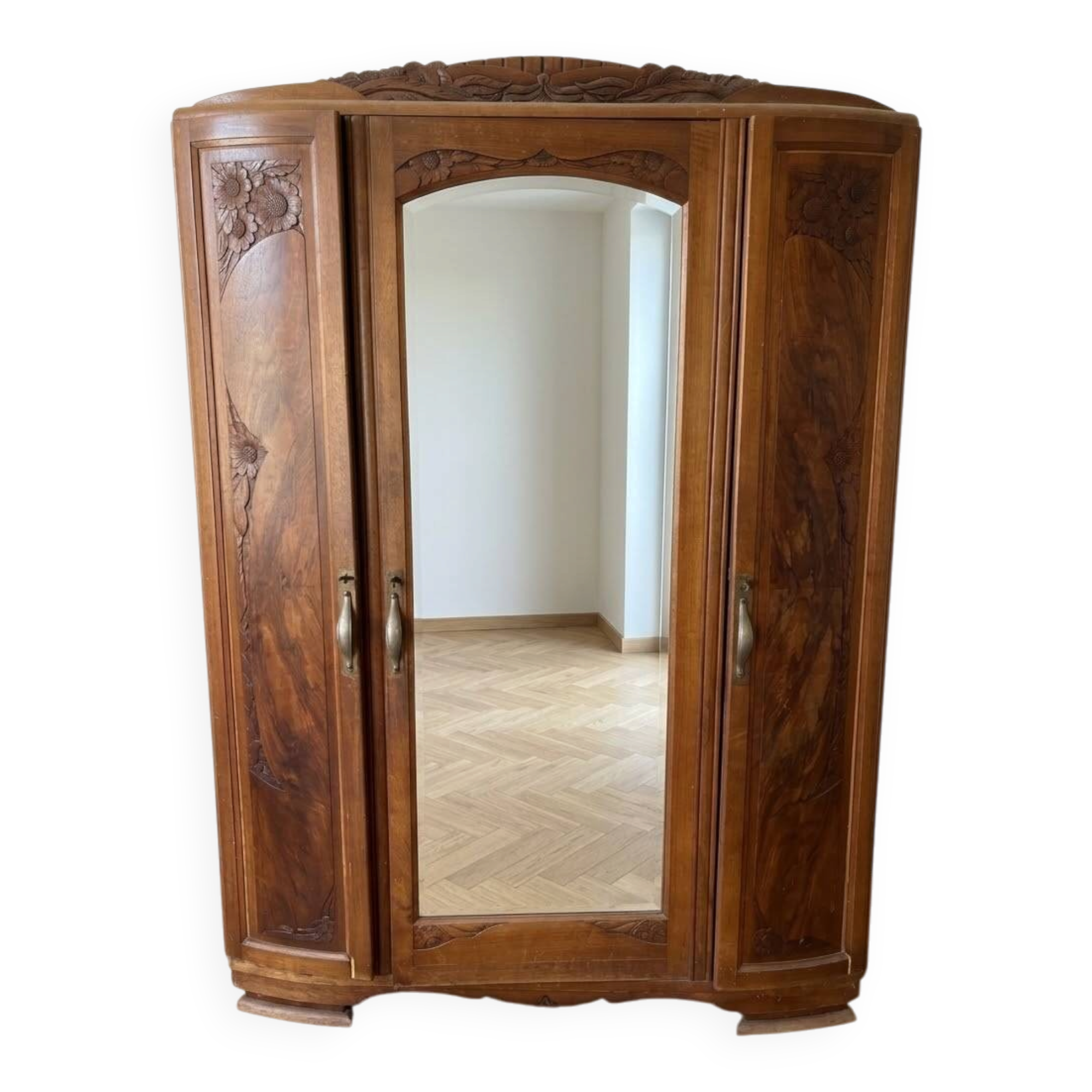 Antique carved wooden wardrobe with mirror