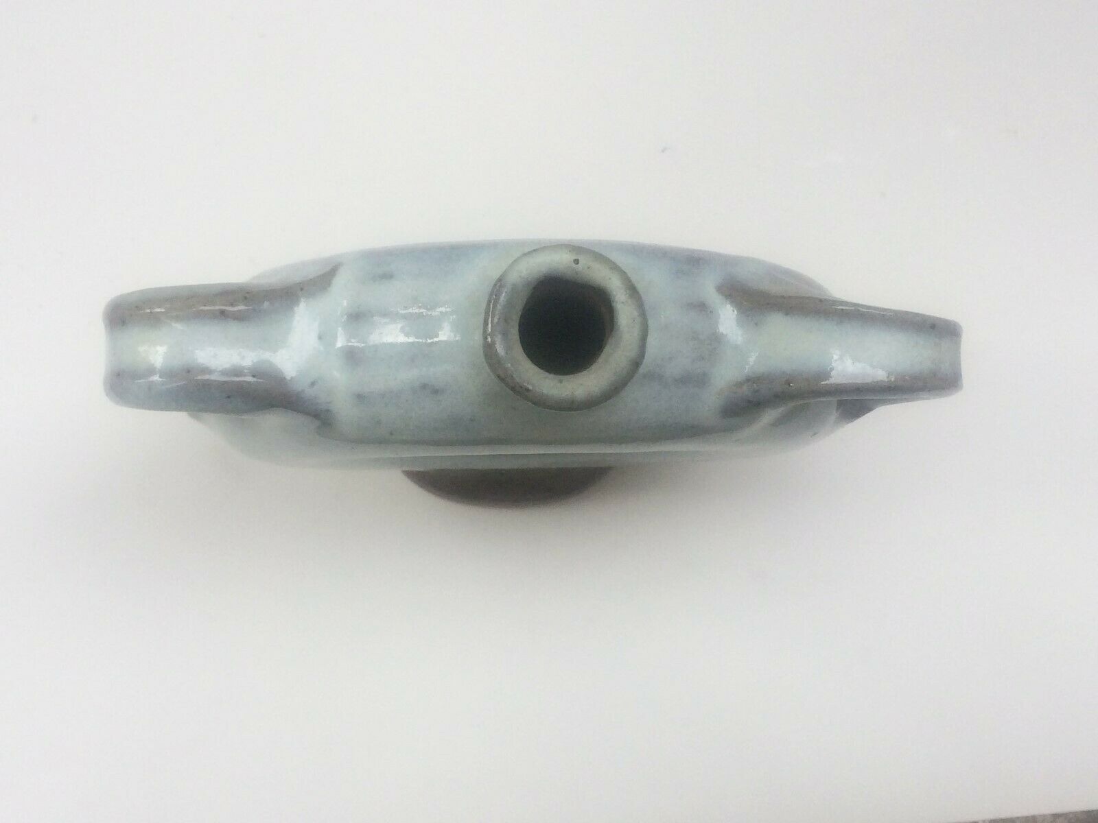 Vernified ceramic vase with handles