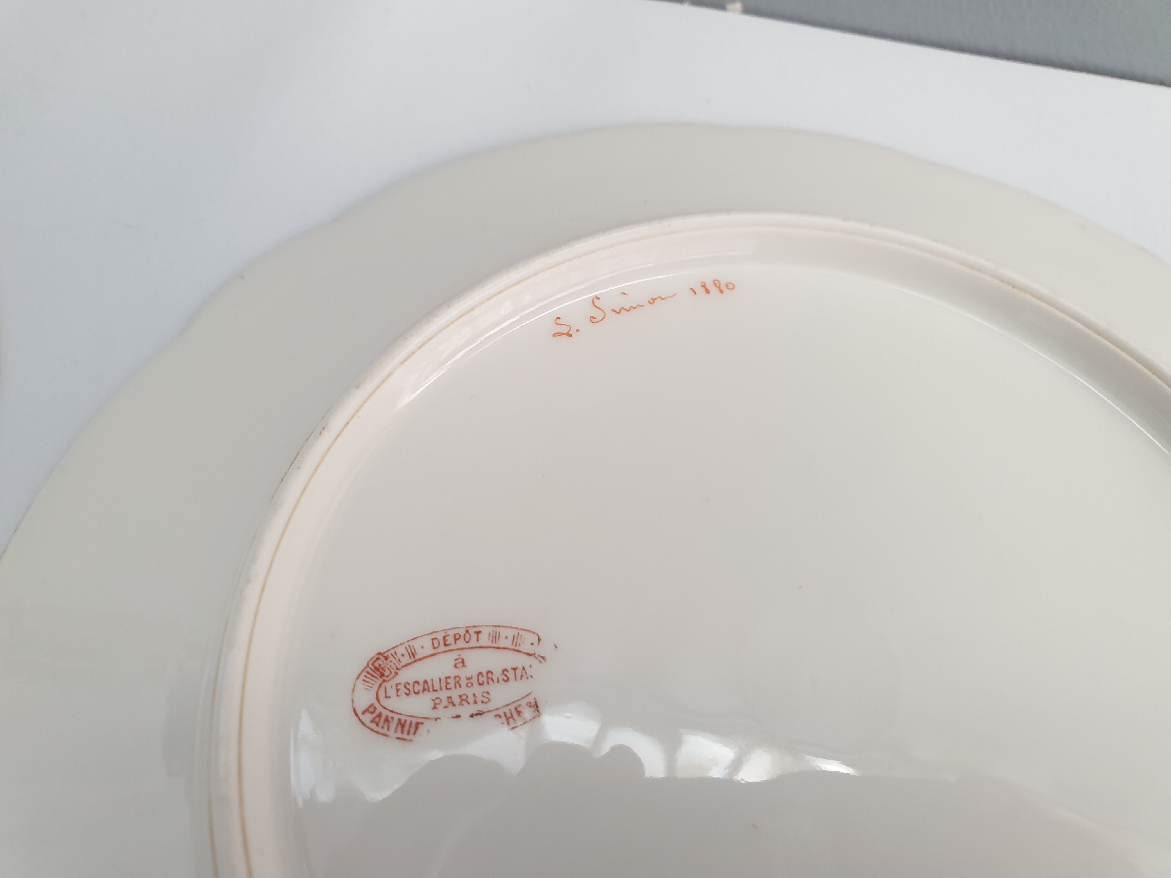 Two antique porcelain plates from Paris The crystal staircase