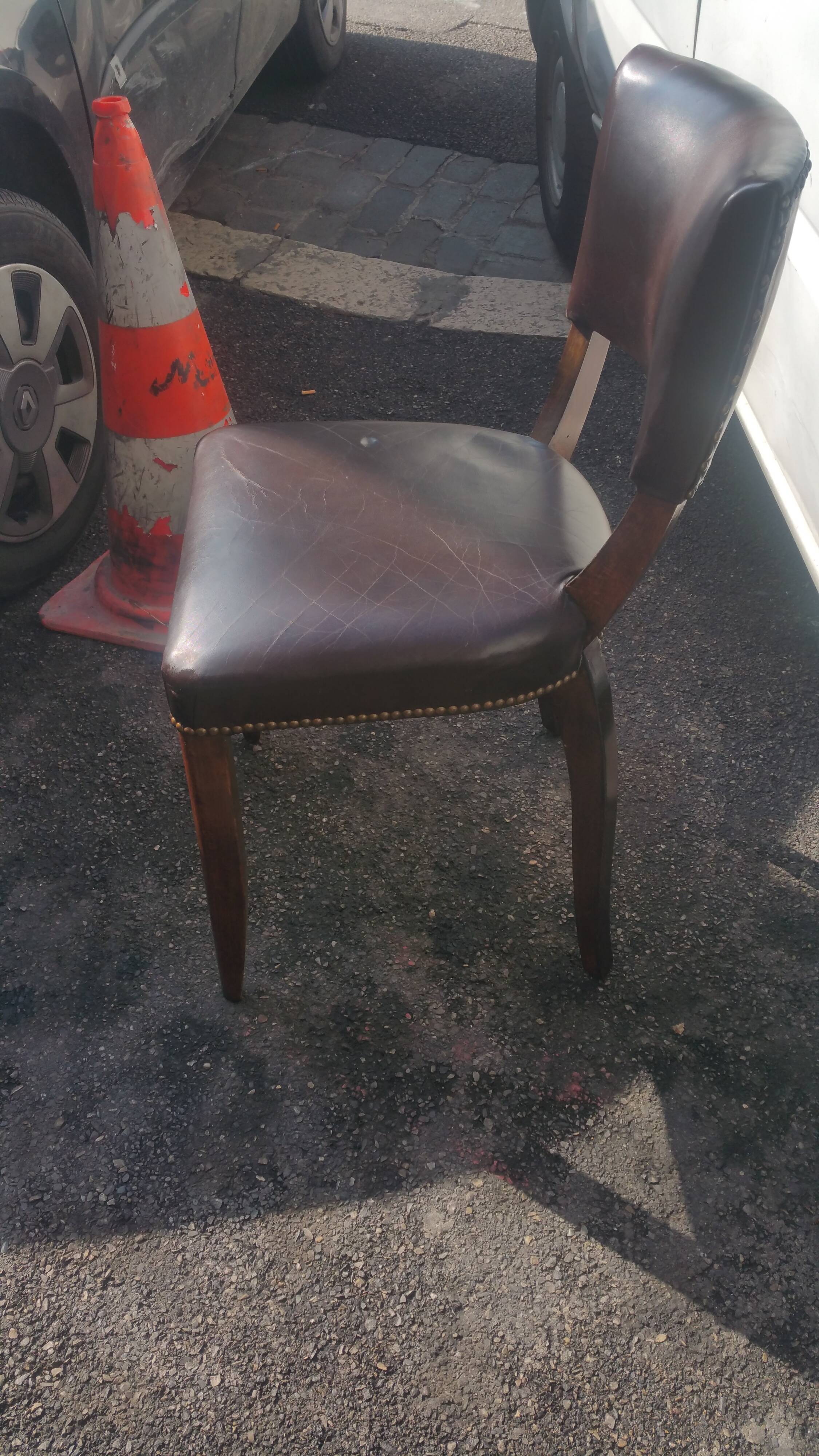 Lot of leather and vintage wood chairs