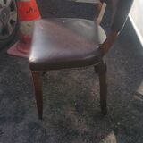Lot of leather and vintage wood chairs