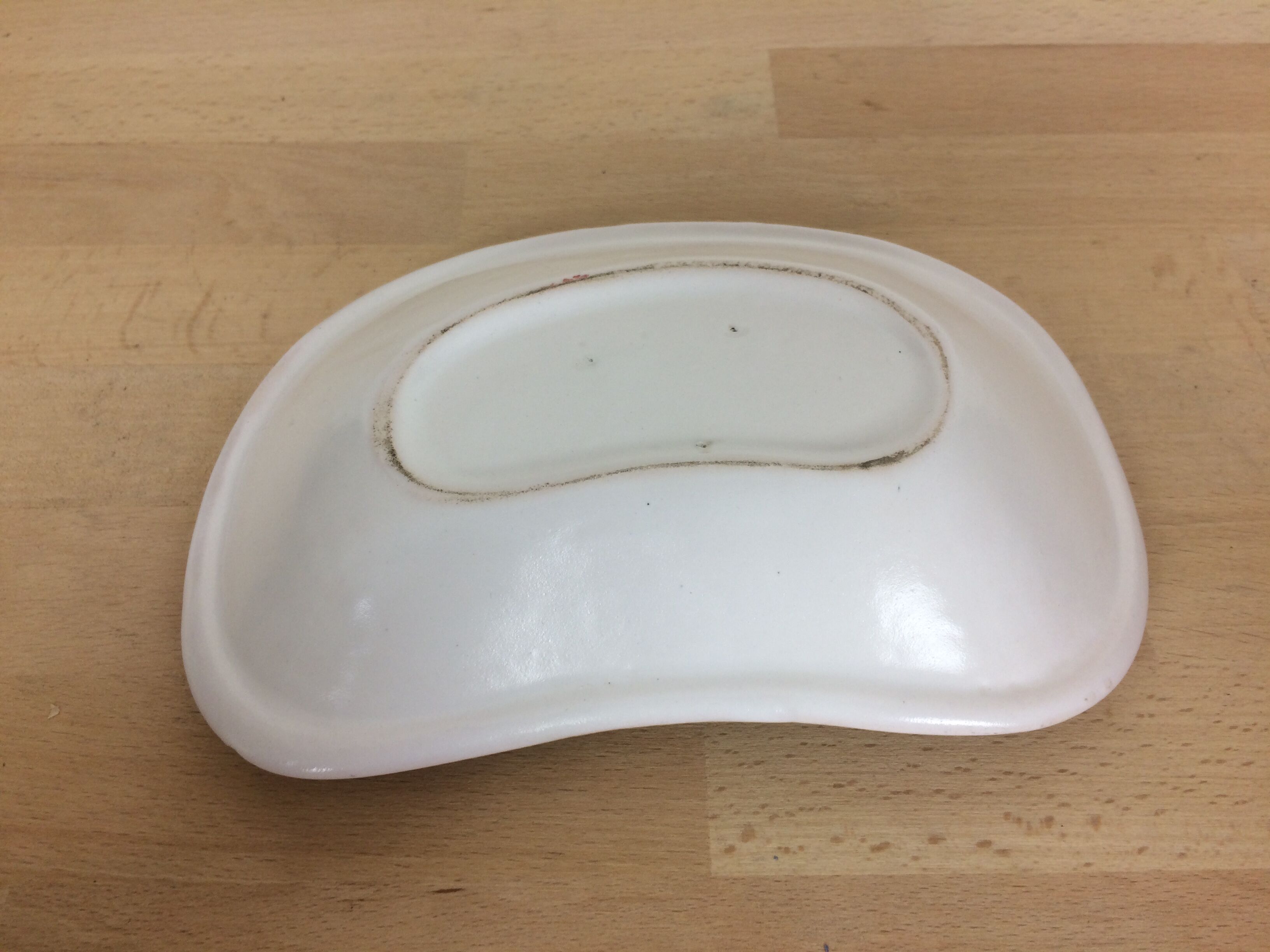 Cup in ceramic, fish and raw vegetables