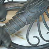 Pair of carved metal wall lamps signed RG