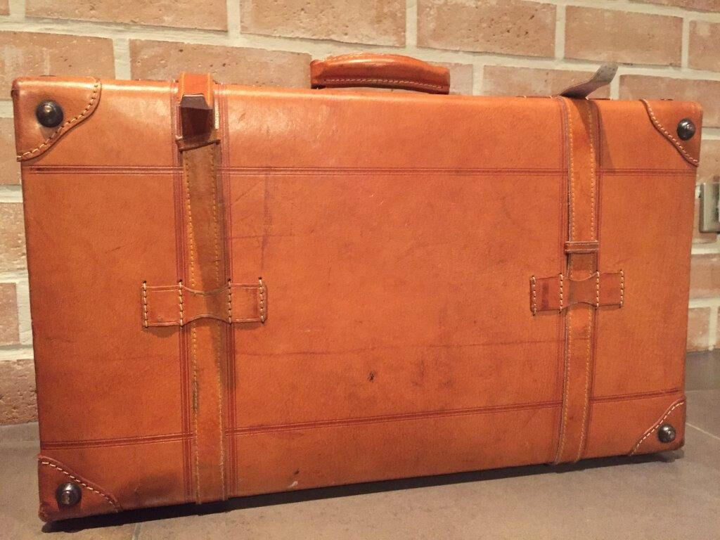 Thick leather suitcase