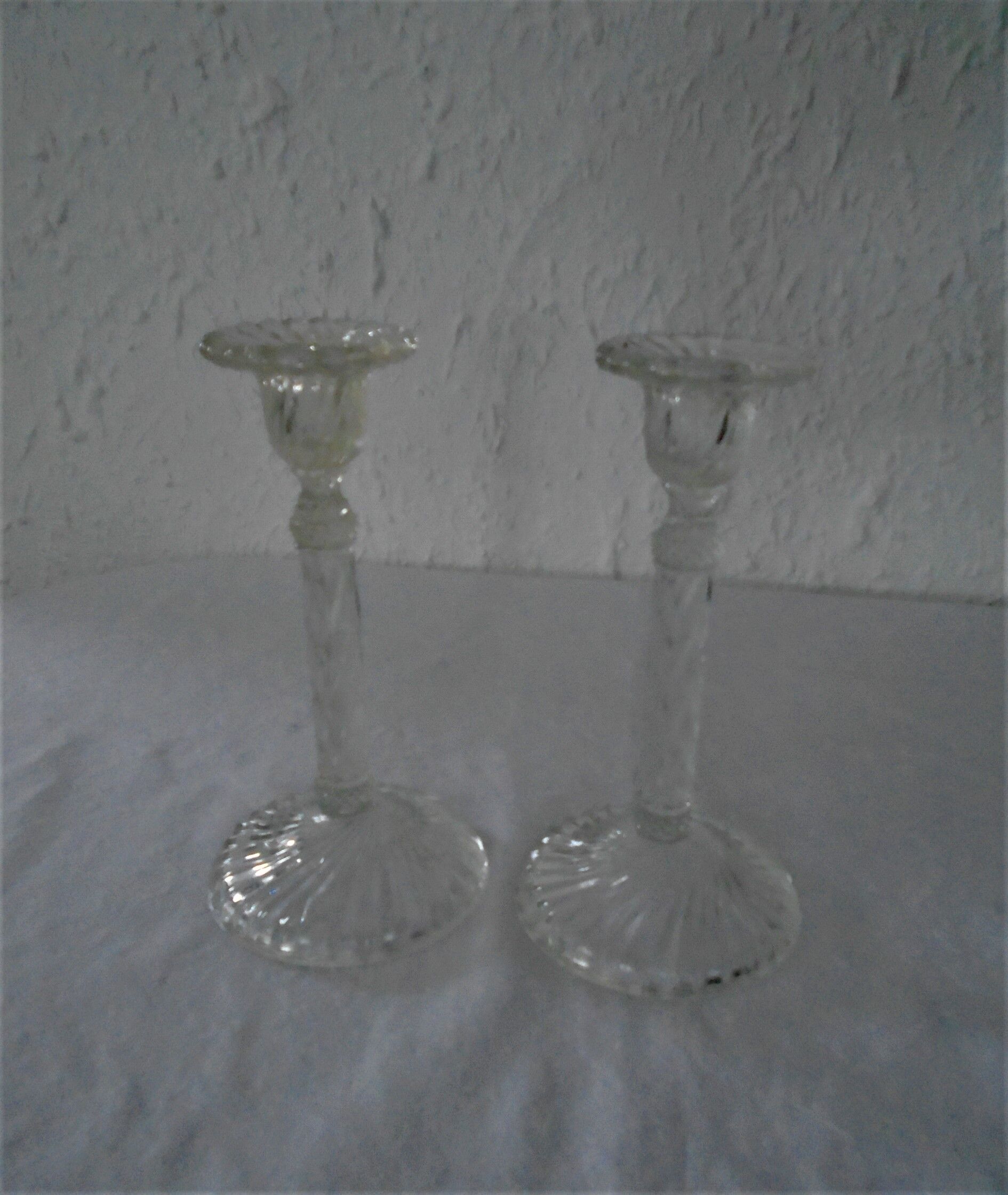 Pair of old glass candlesticks
