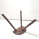 Brutalist tripod stool in solid wood half round