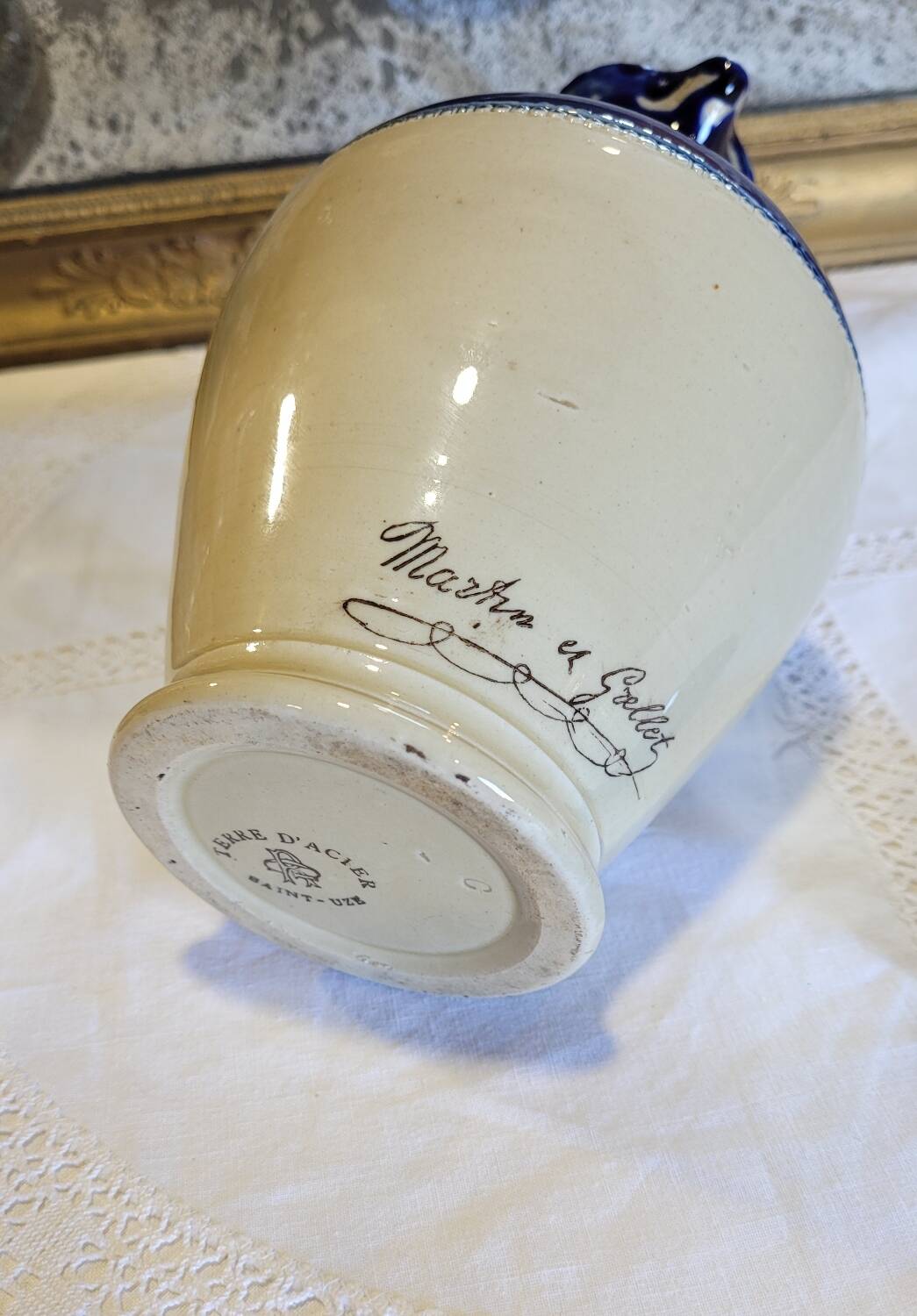 Antique iron-rich earth bottle from Saint Uze, ceramic carafe jug.