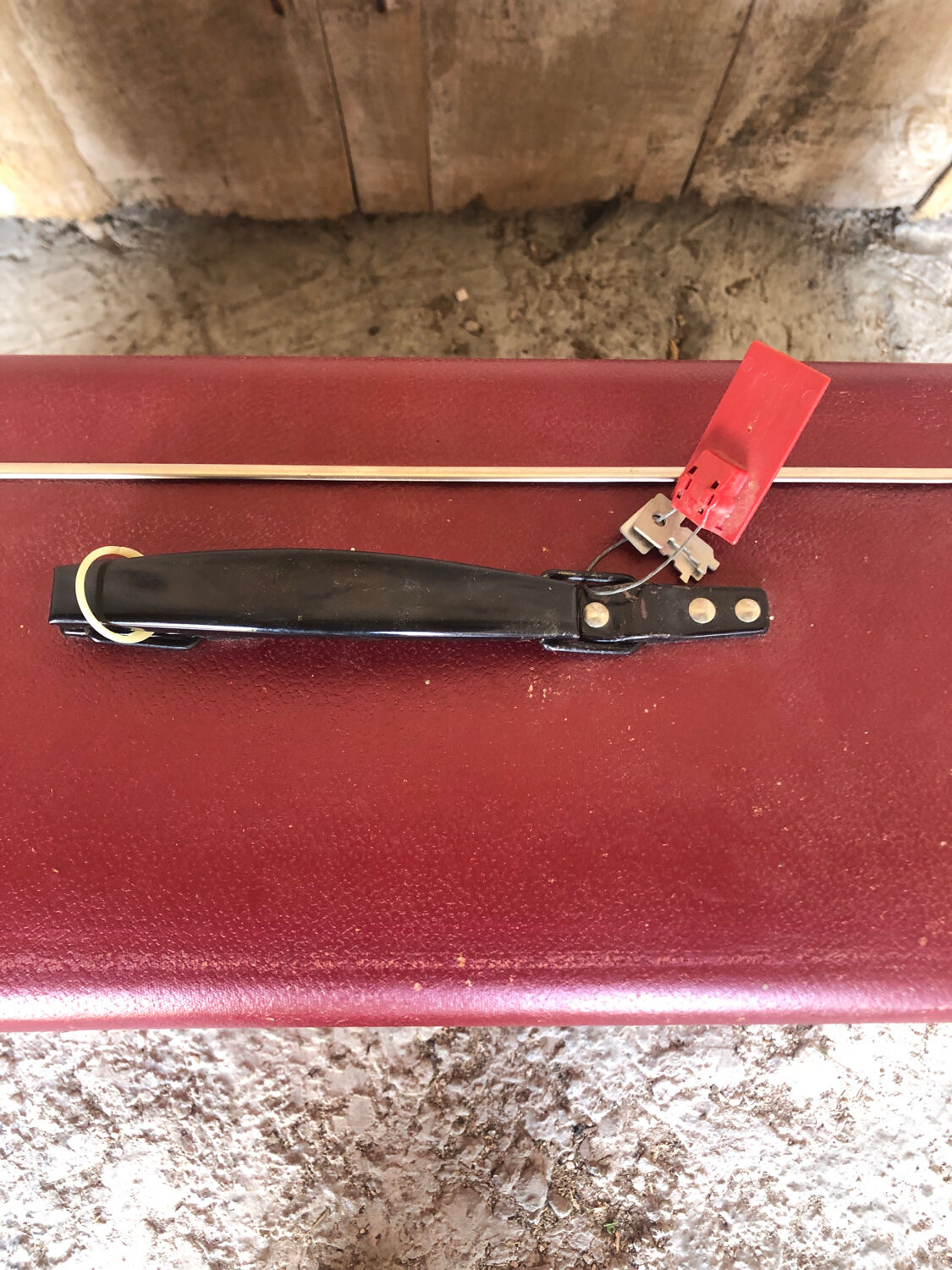 Old suitcase red cardboard bordeaux clasp metal vintage