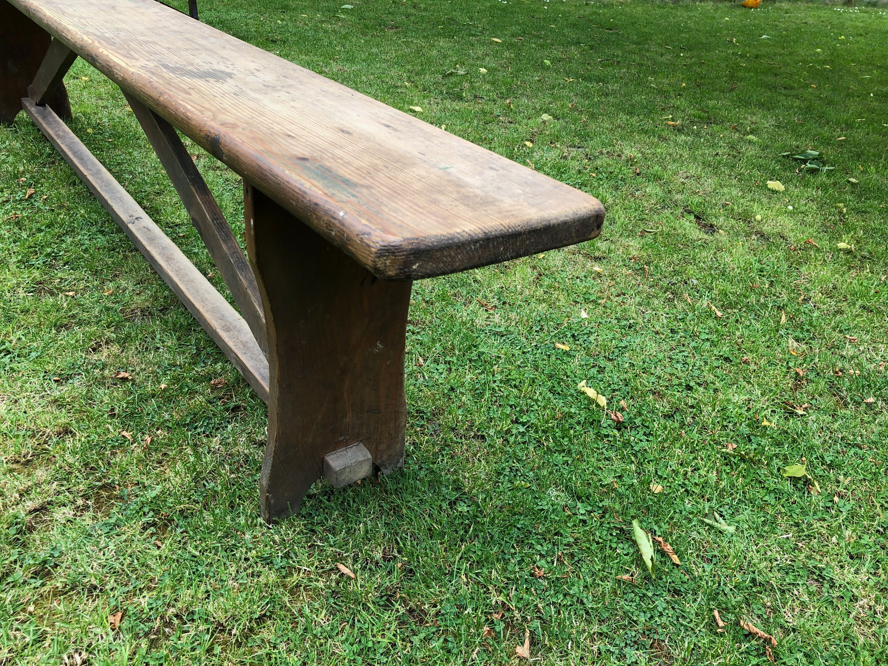 Old solid wood farm bench