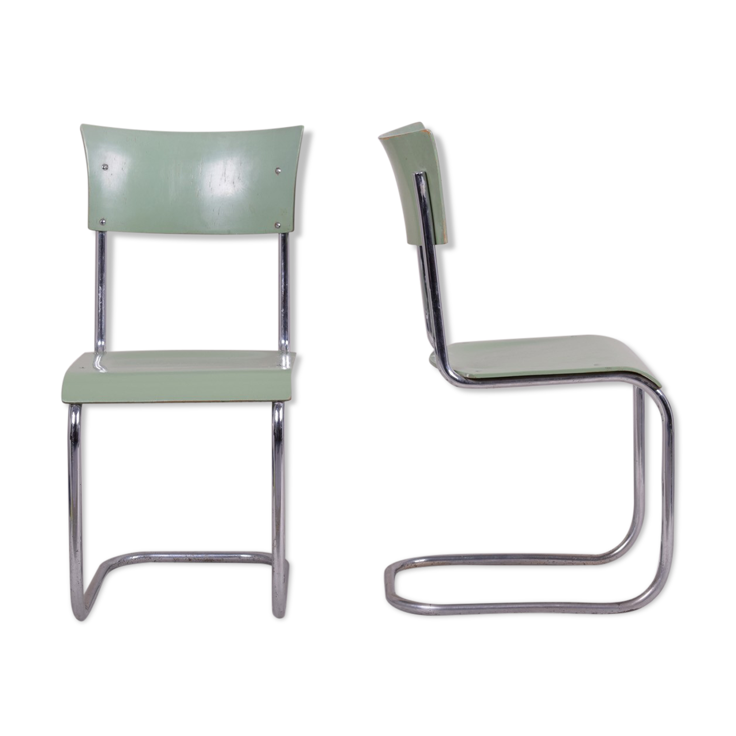 Pair of green Bauhaus chairs made in 1930s Czechia. Made by Robert Slezák