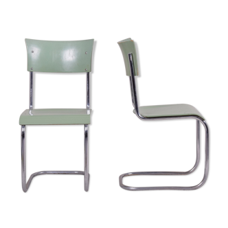 Pair of green Bauhaus chairs made in 1930s Czechia. Made by Robert Slezák