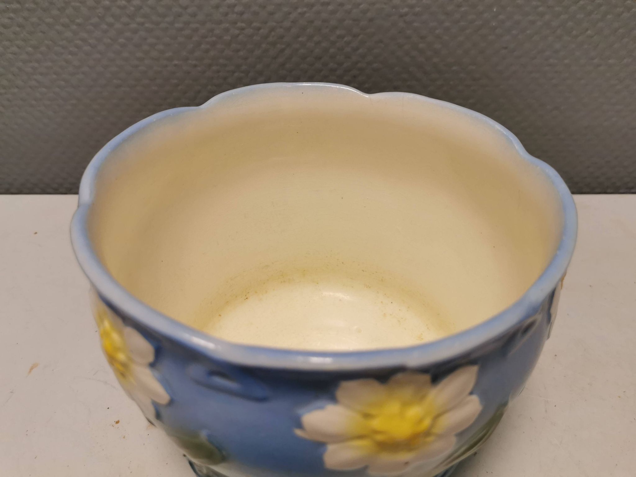 Very beautiful flower pot in soft blue and white color with floral motifs.