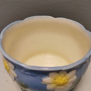 Very beautiful flower pot in soft blue and white color with floral motifs.