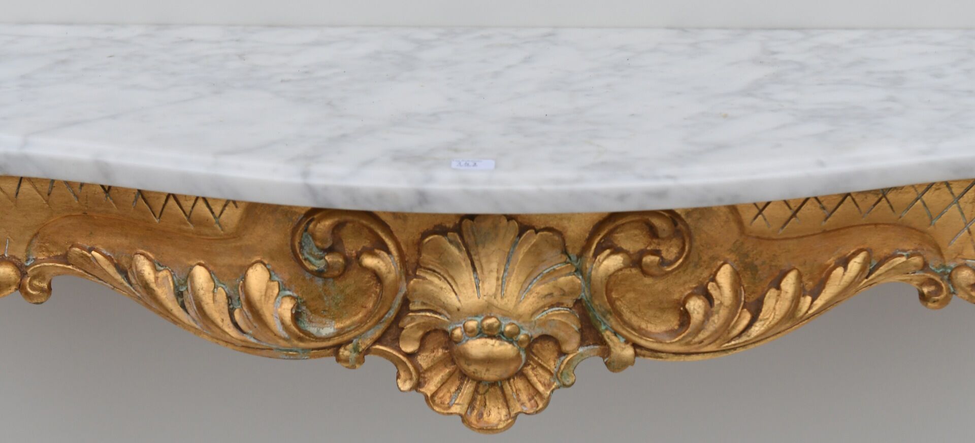Rocker-style gilded wooden console