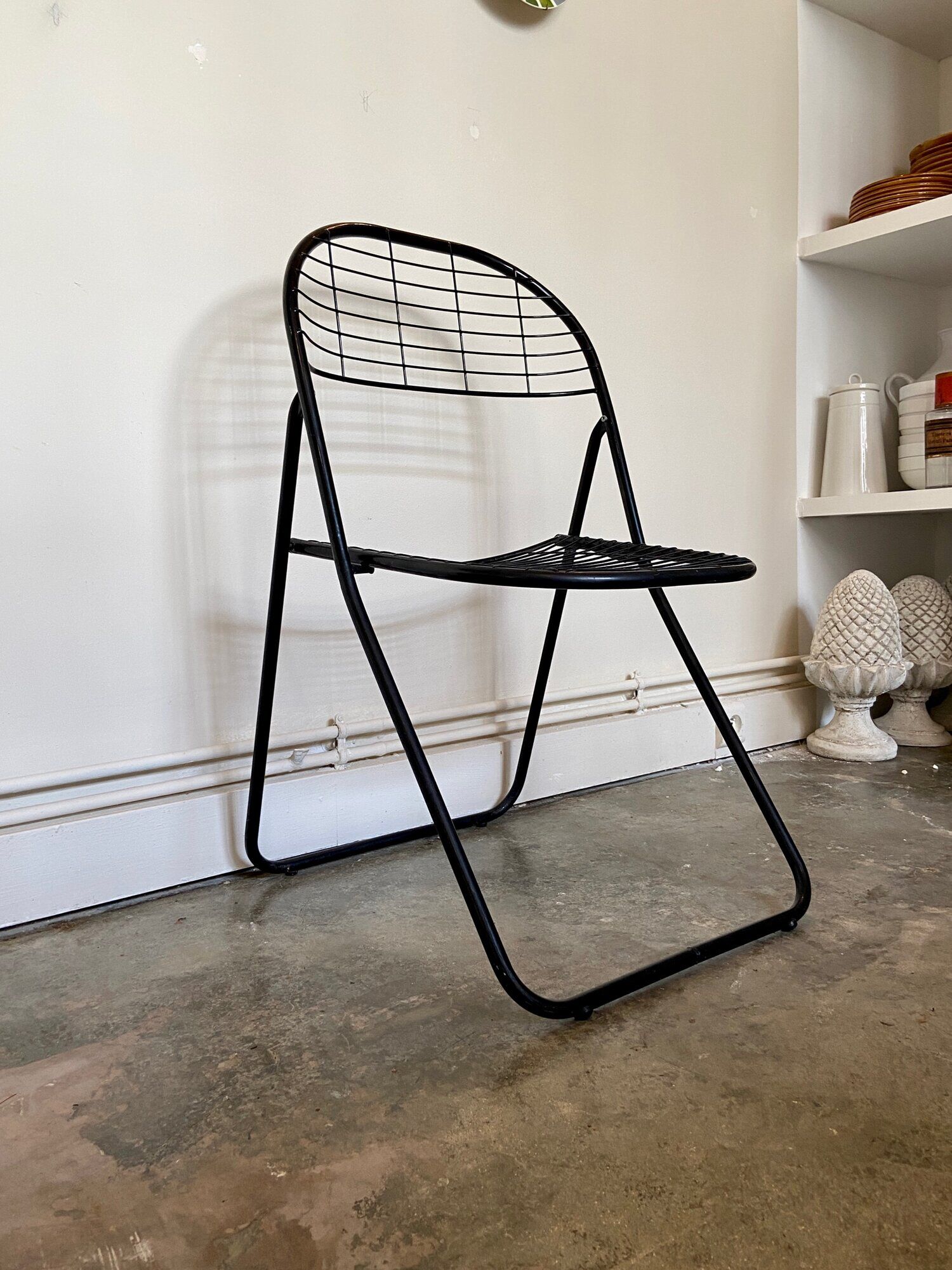 Black metal folding chair