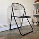 Black metal folding chair