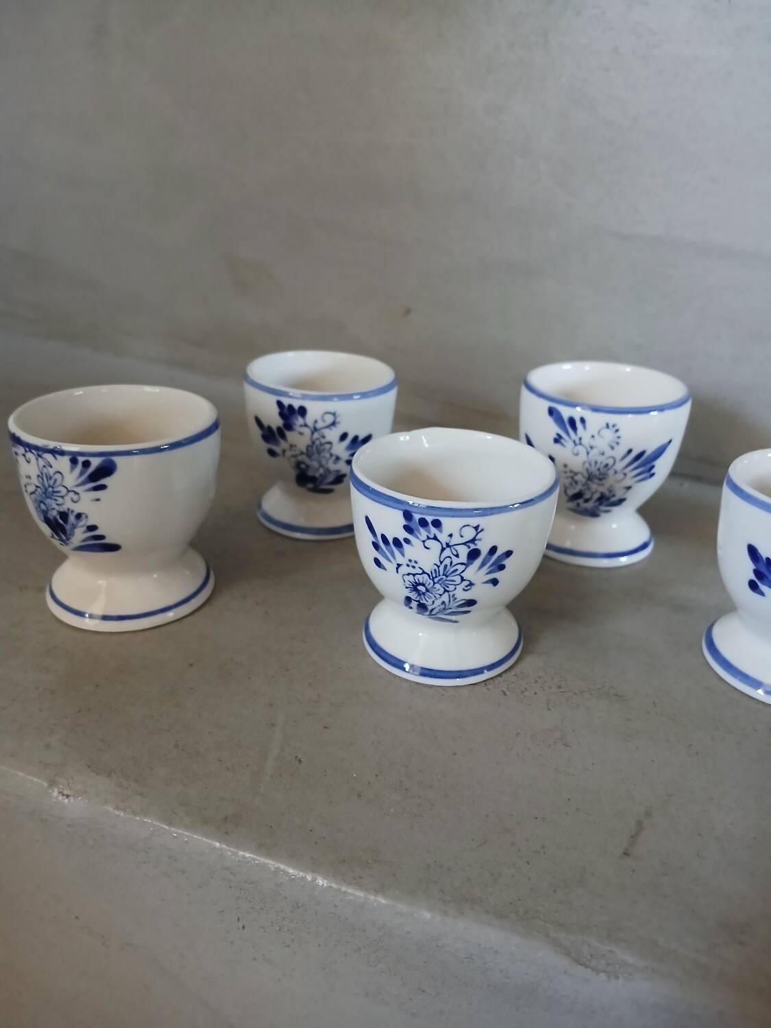 7 antique egg cups