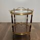 Oval Rolling Table in Brass and Mahogany with Openwork Gallery and Bottle Holder