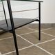 Metal and glass coffee table with magazine rack by Roche Bobois from the 1950s.