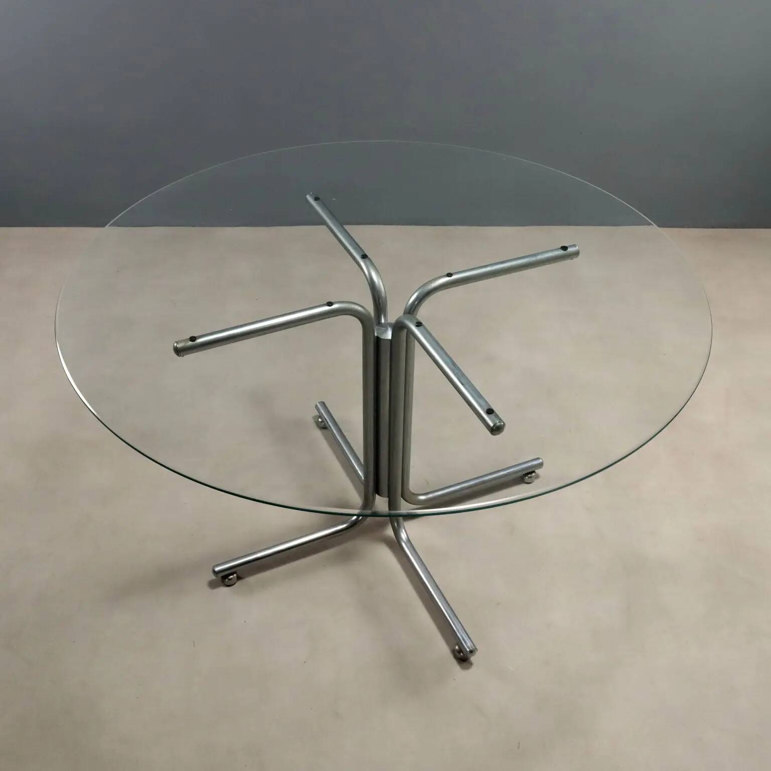 Vintage round table in chrome metal and glass, 1970s.