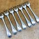 7 Christofle silver-plated oyster forks with Louis crossed ribbons