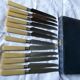 box of 12 stainless steel knives with bakelite handle and silver metal ferrule art decp