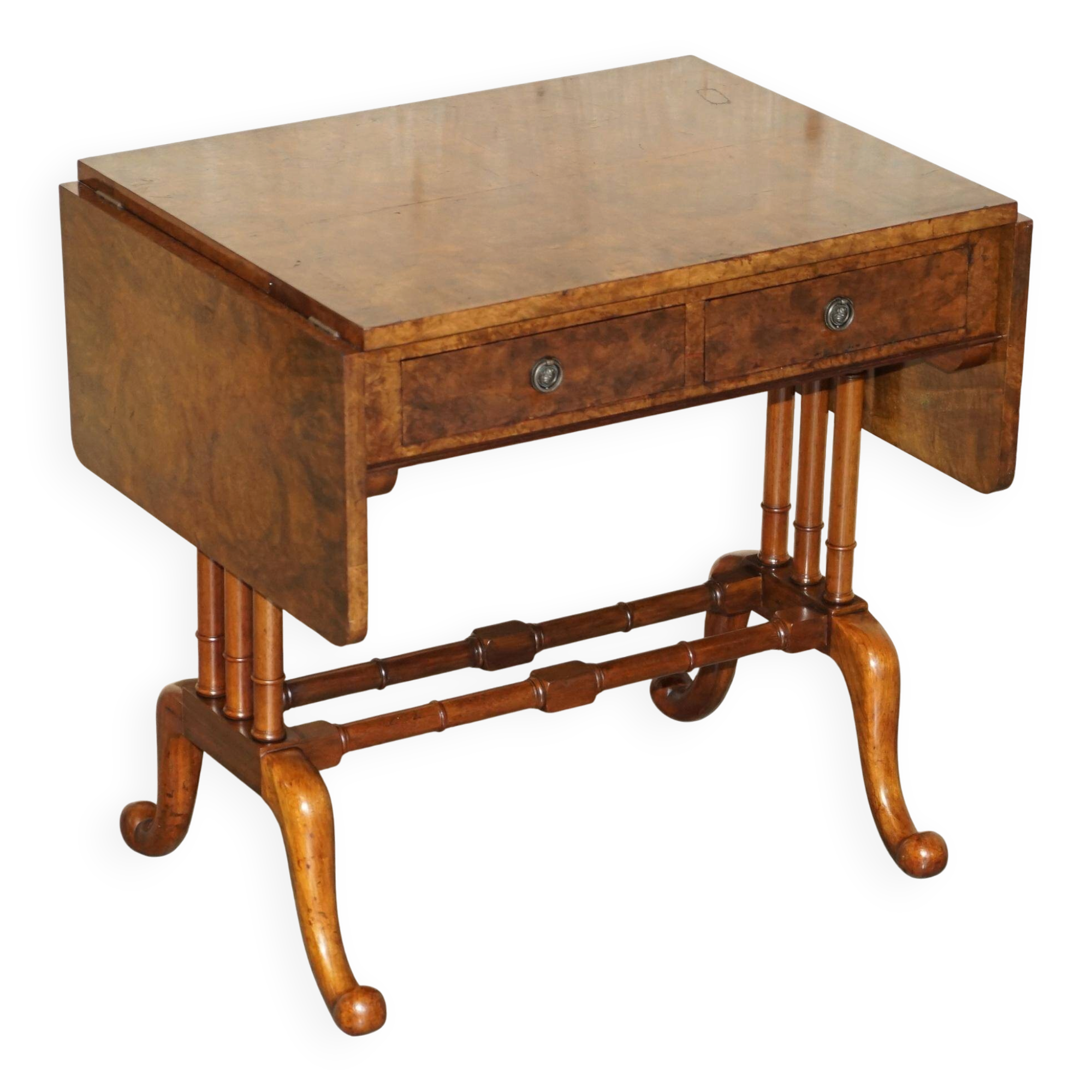 Antique extendable coffee table circa 1880 in solid walnut.