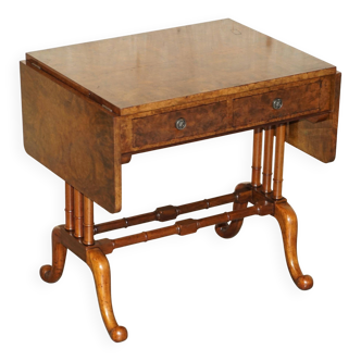 Antique extendable coffee table circa 1880 in solid walnut.