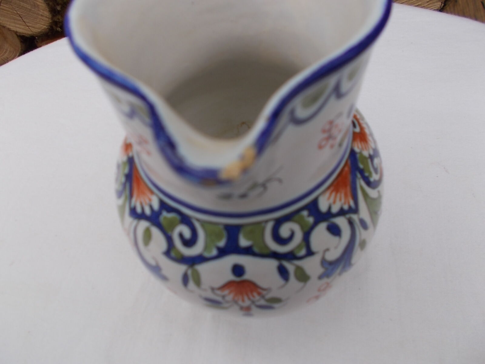 Decorated earthenware jug