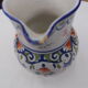 Decorated earthenware jug