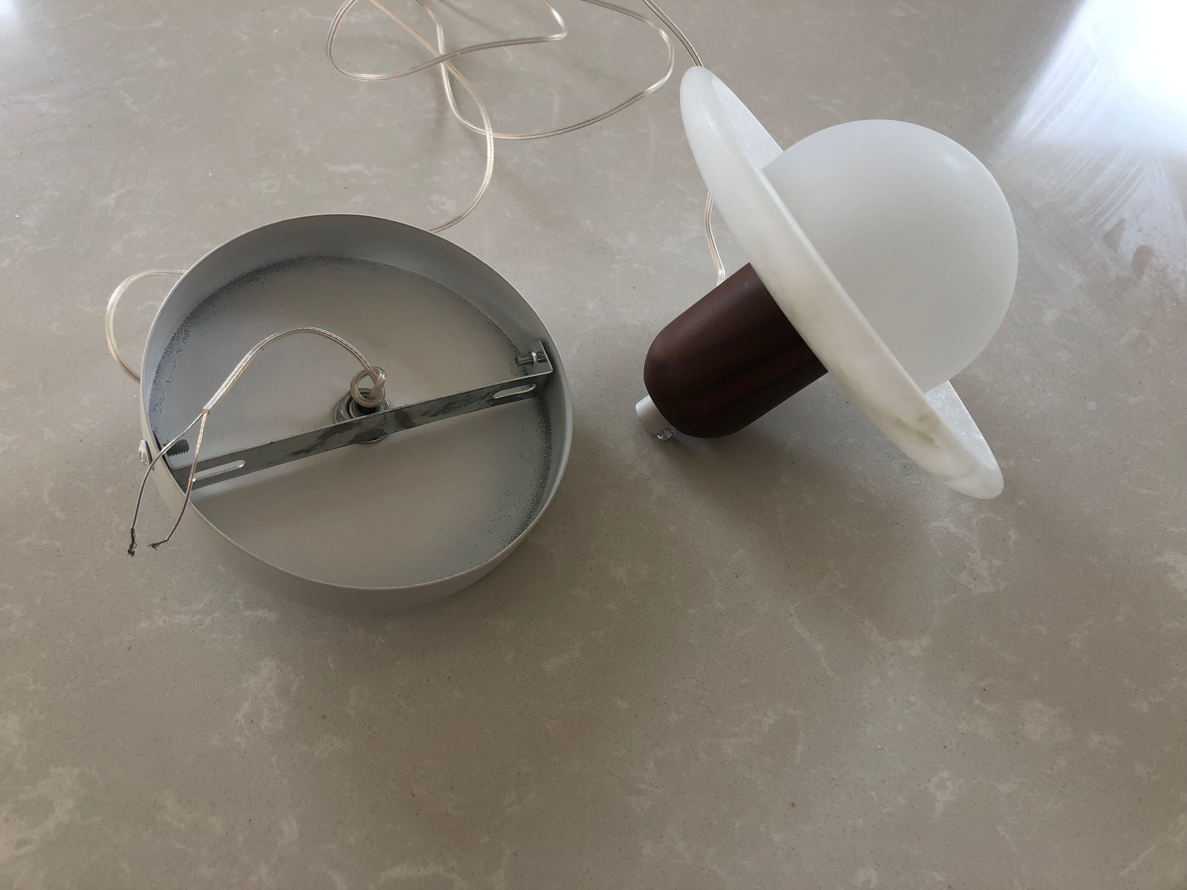 Pair of onyx and walnut suspended light fixtures