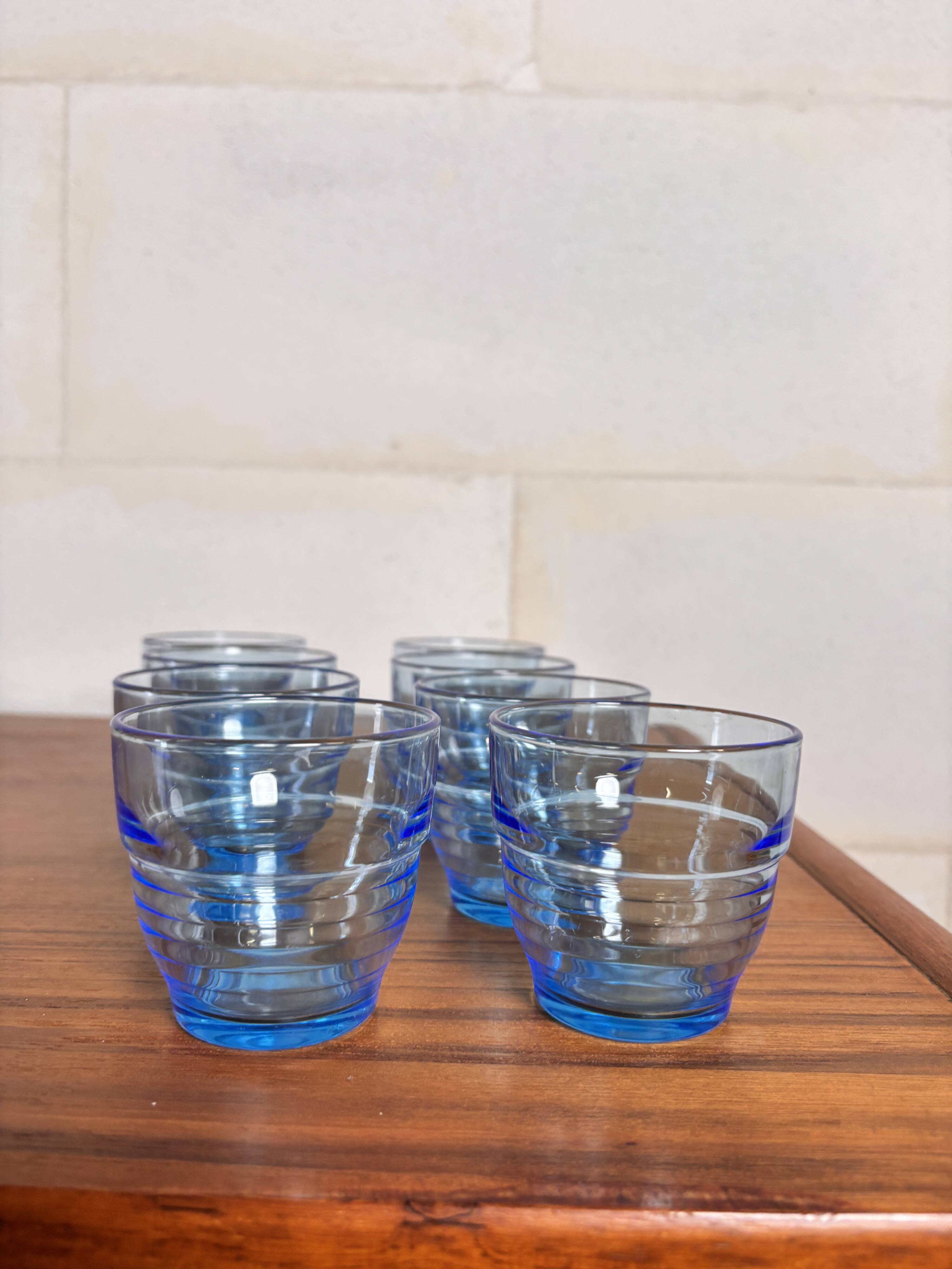 Set of 8 blue Arco France glasses.