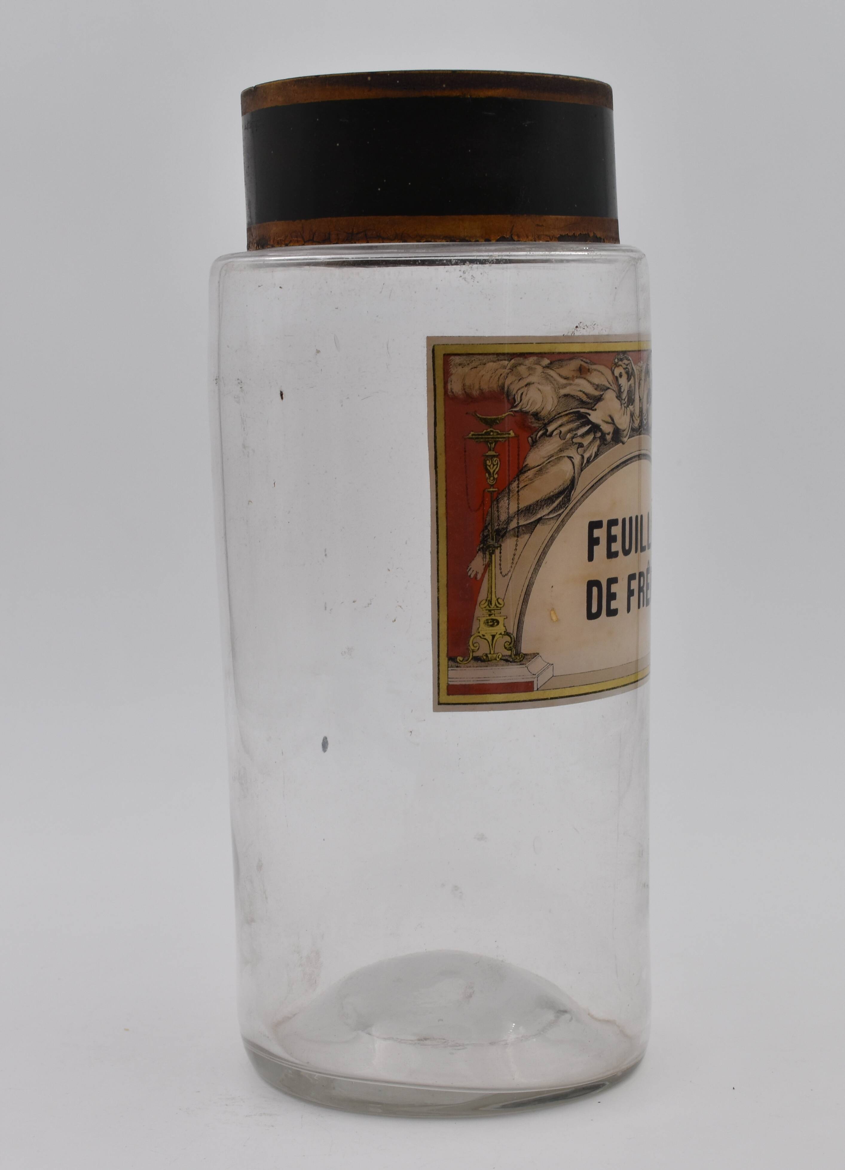 Ancient apothecary flask ash's leaves