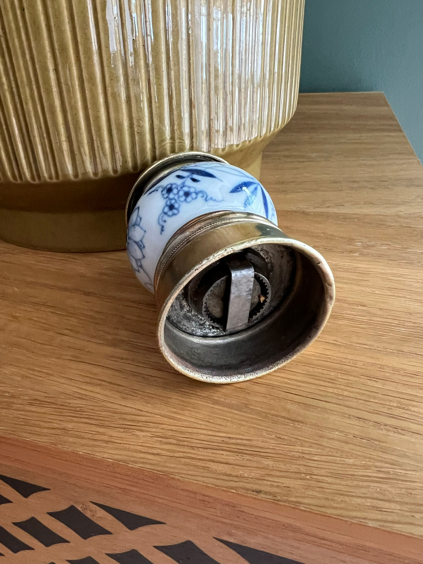Antique porcelain pepper mill with floral design and gold-plated metal / brass –