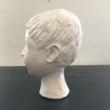 Plaster girl's head
