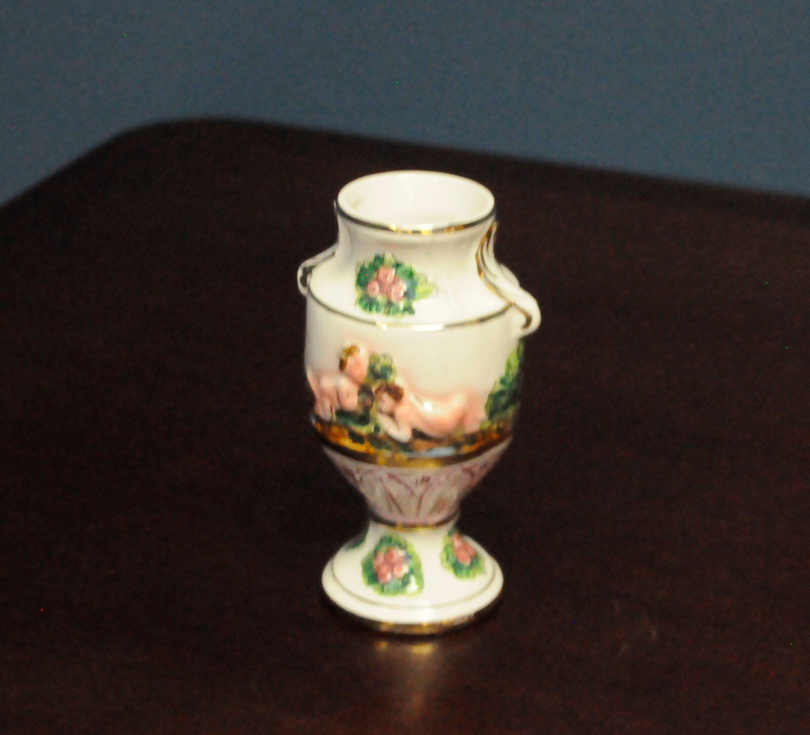 Amphora Capo Di Monte hand painted.