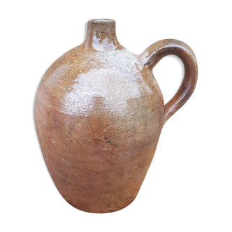 Old varnished sandstone oil jar