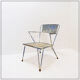 Vintage perforated metal armchair from the 1950s.