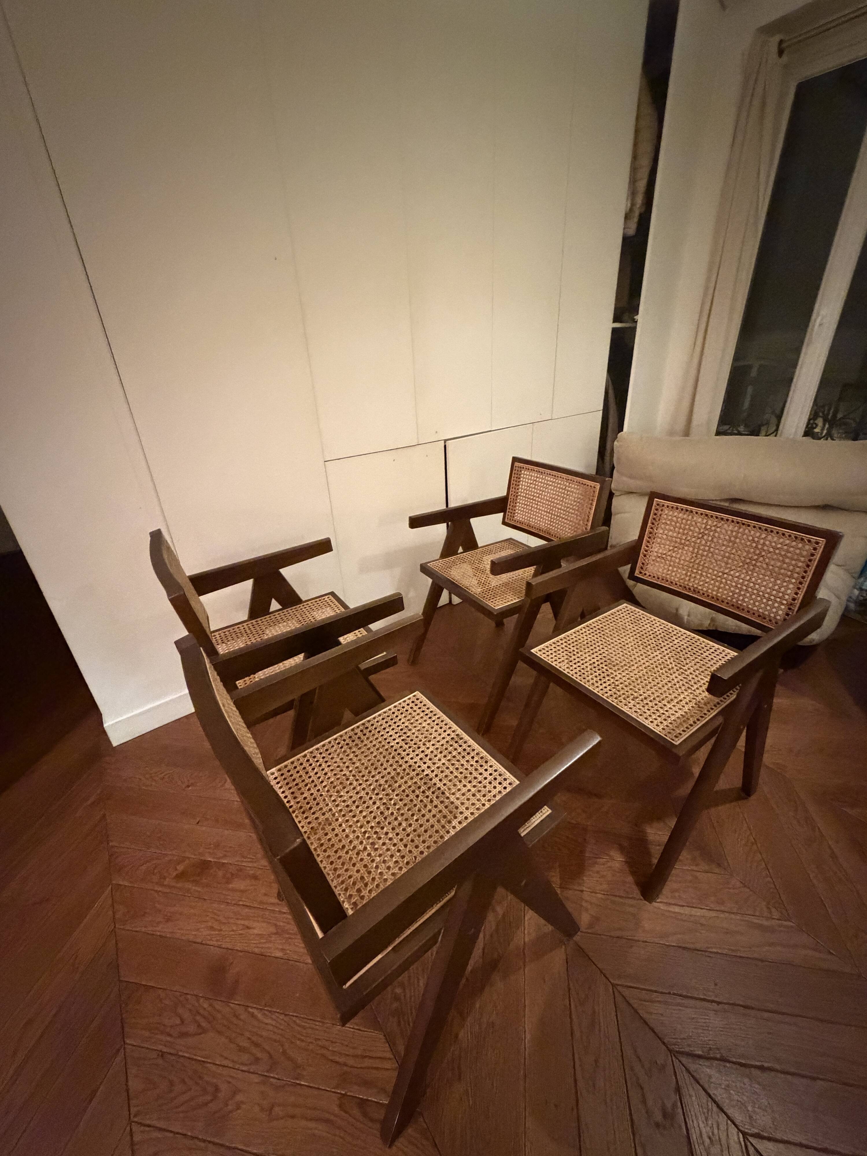 Chairs by Pierre Jeanneret