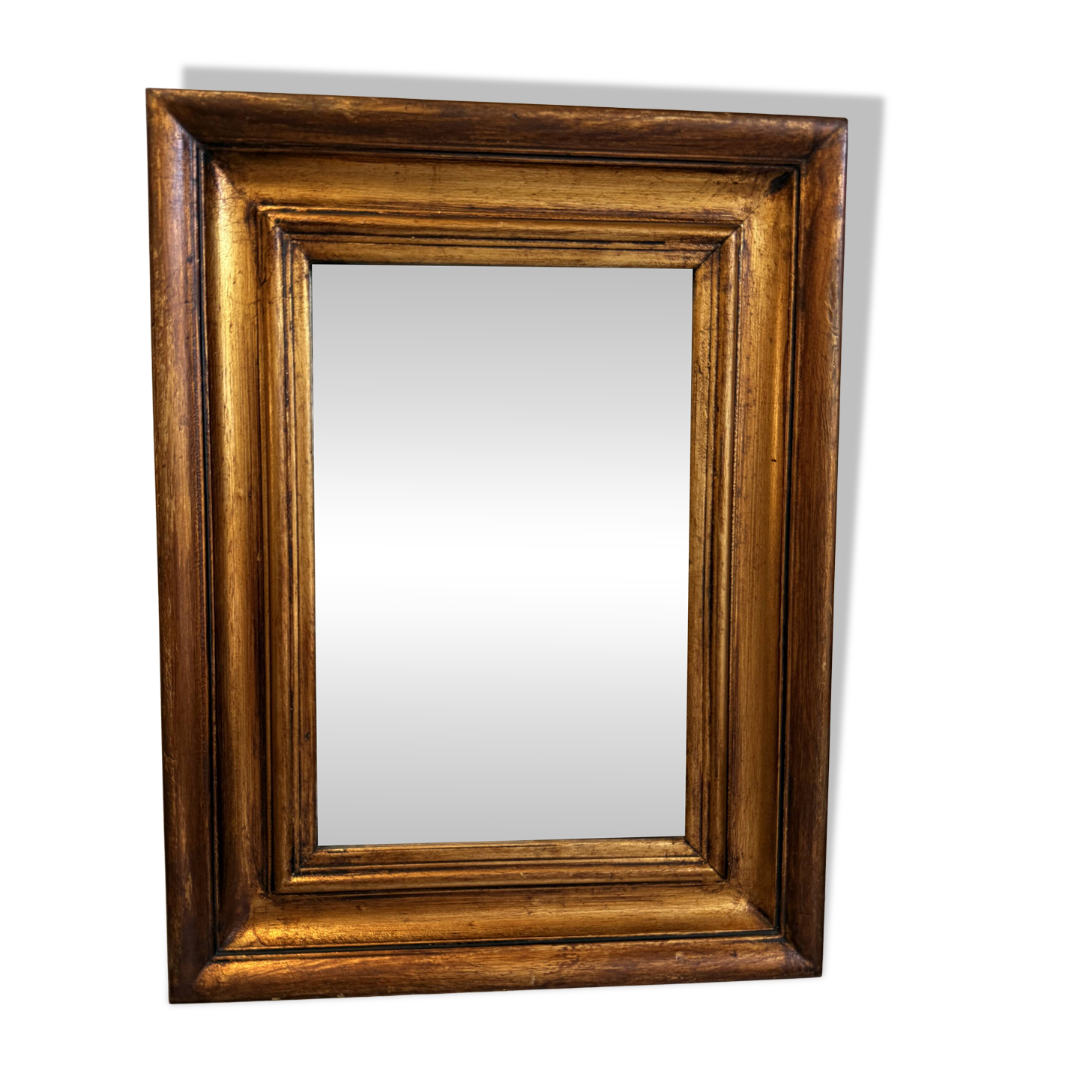 Miroir ancien en bois doré à la feuille