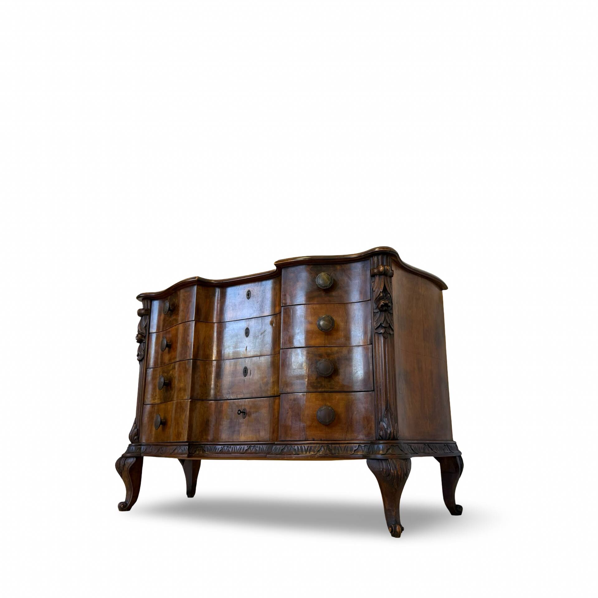 serpentine commode in antique walnut