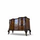 serpentine commode in antique walnut