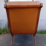Chesterfield armchair in wood and leather