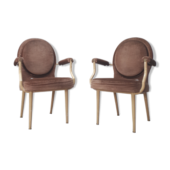 Paire de fauteuils médaillon des années 60