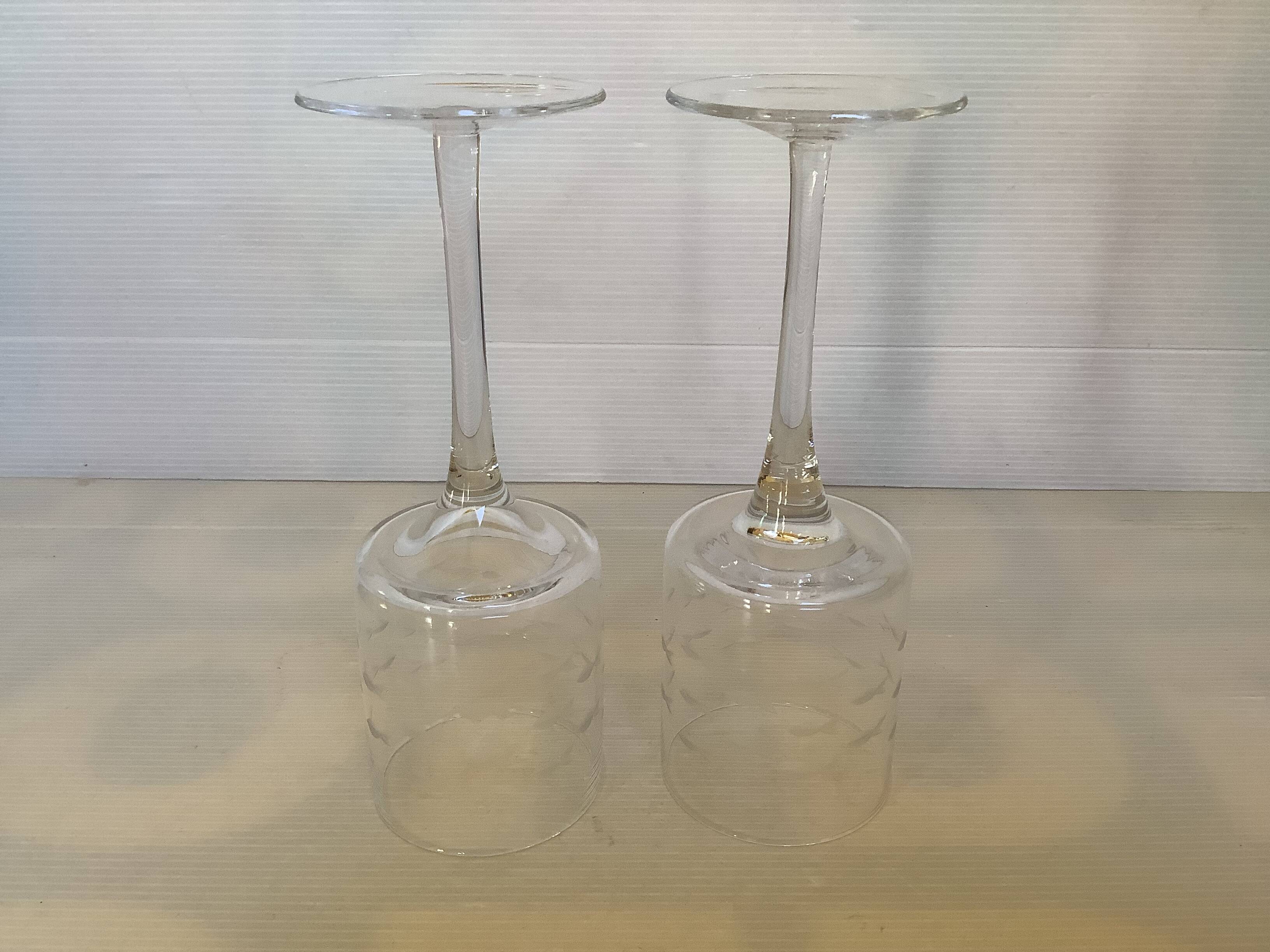 Duo of cut glass fish candle holders