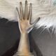 Hand holds jewelry
